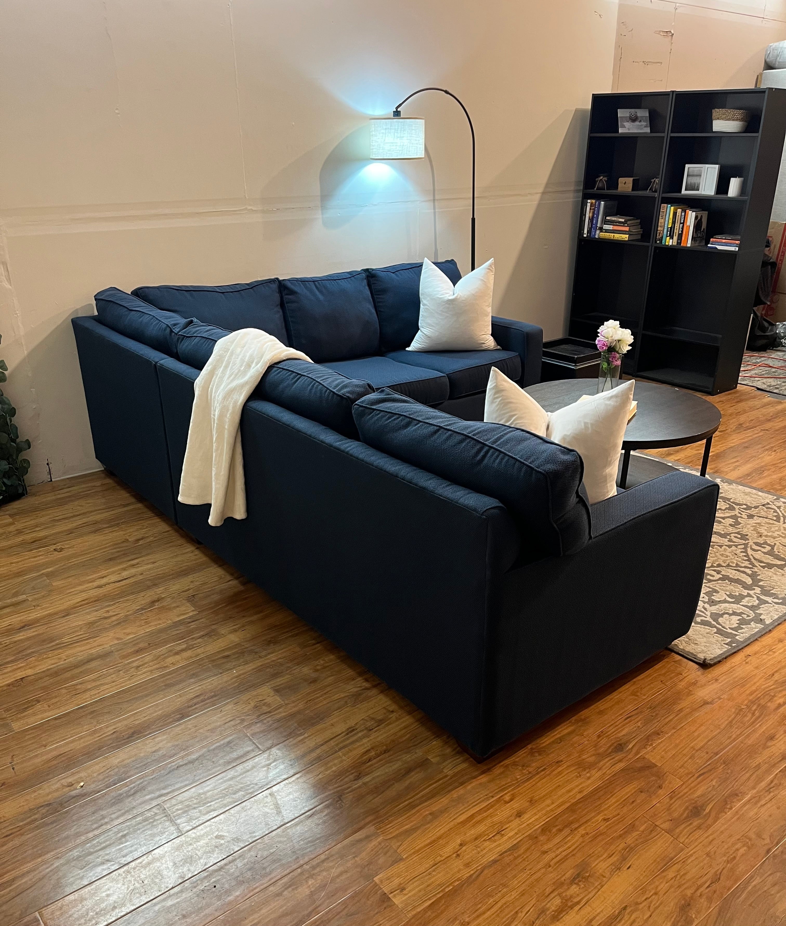 Jordan’s Furniture Corner Sectional in Navy Blue