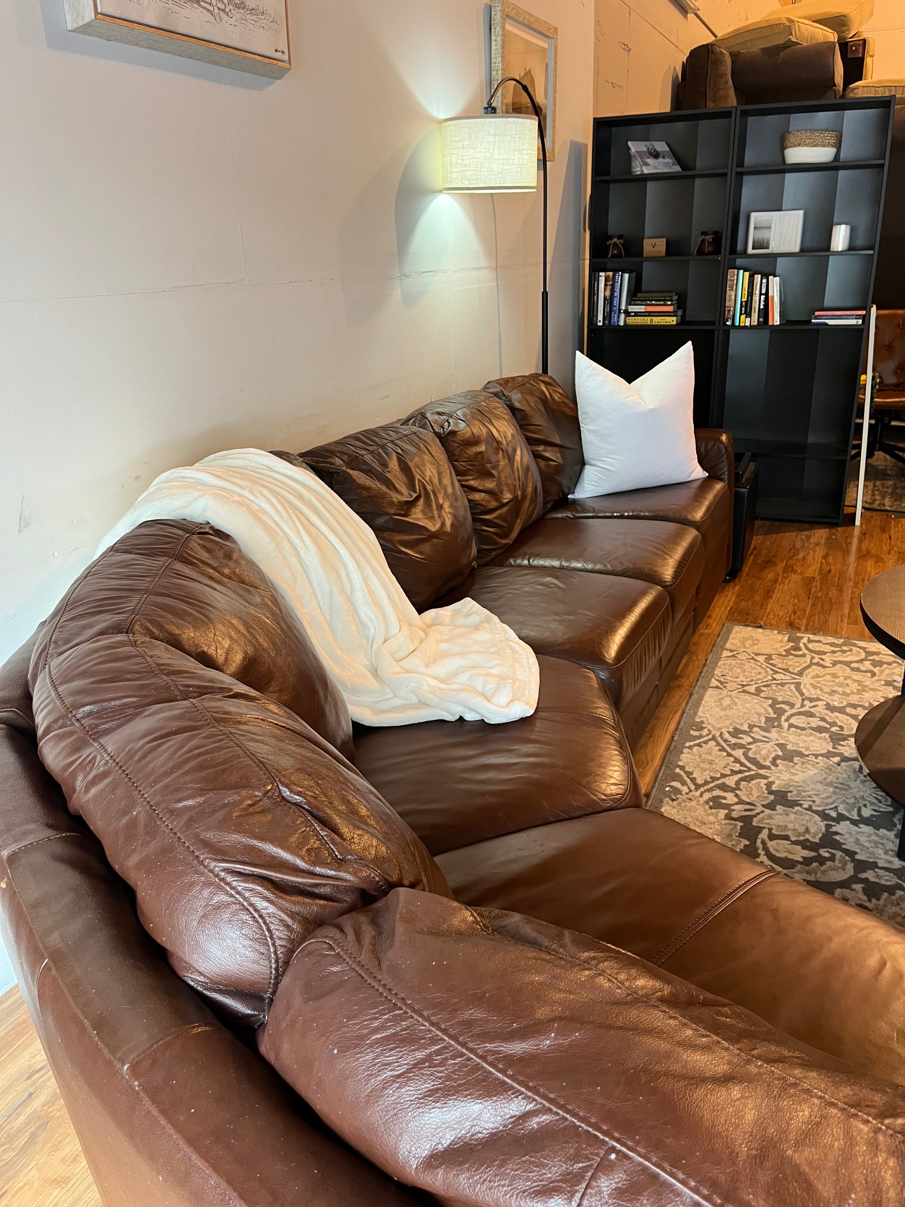 Jordan’s Furniture Leather Sectional in Espresso
