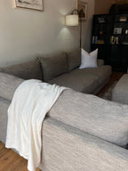 Cardi’s Furniture Sectional and Ottoman in Stone Gray