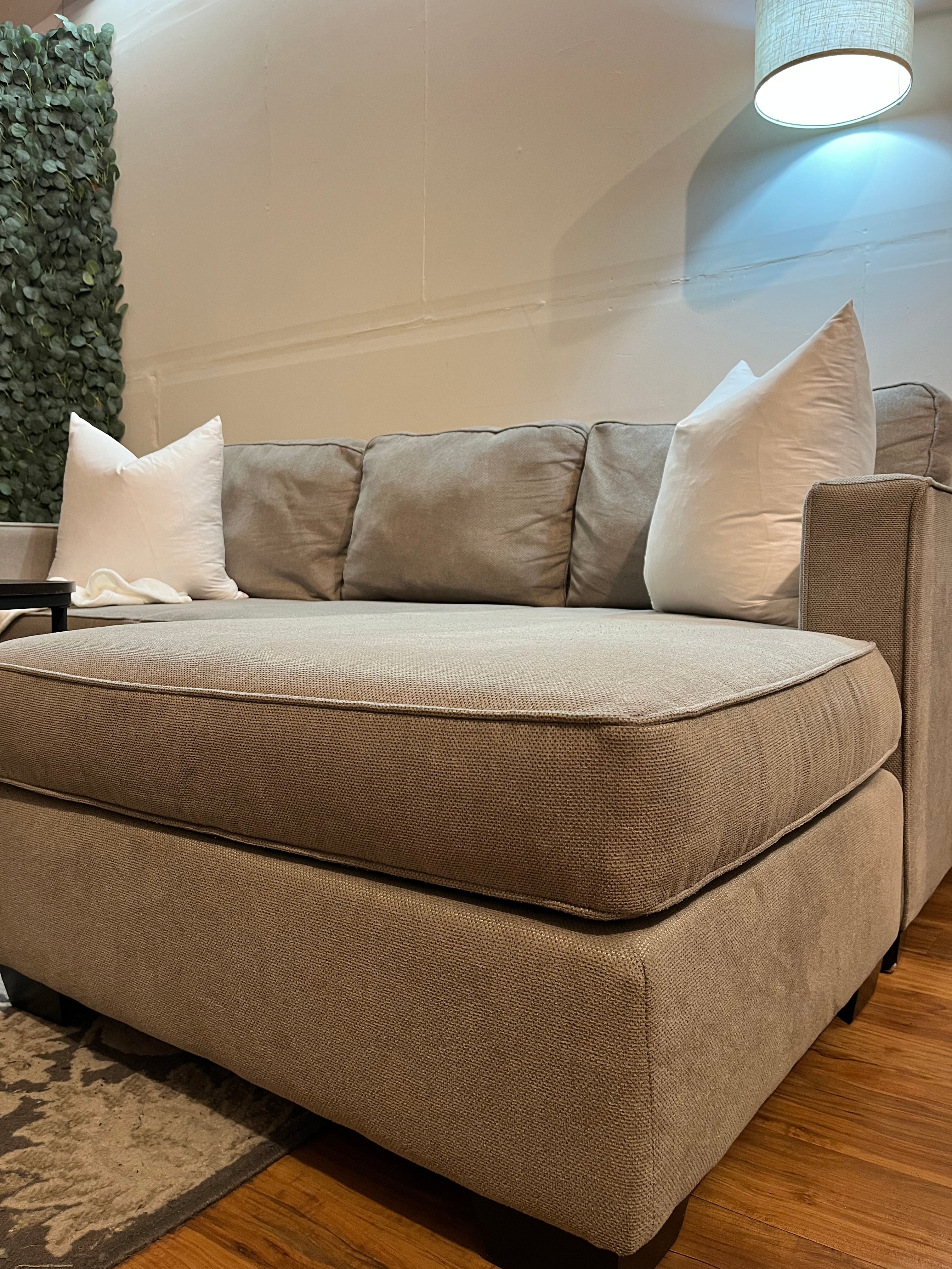 Jordan’s Furniture Sectional with Reversible Chaise in Steel Gray