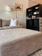 Cardi’s Furniture Sectional and Ottoman in Stone Gray