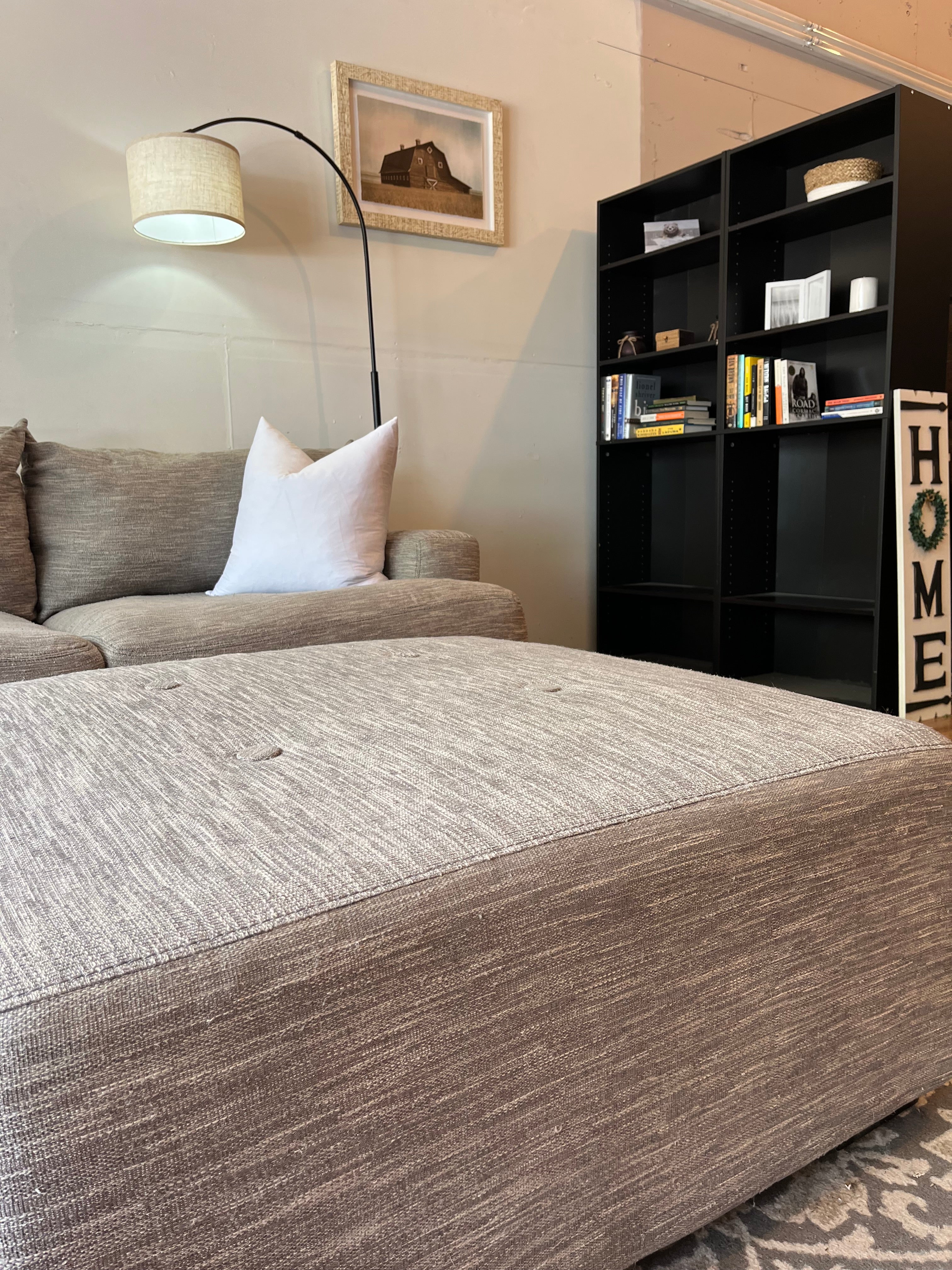 Cardi’s Furniture Sectional and Ottoman in Stone Gray