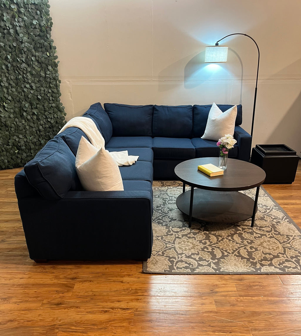 Jordan’s Furniture Corner Sectional in Navy Blue