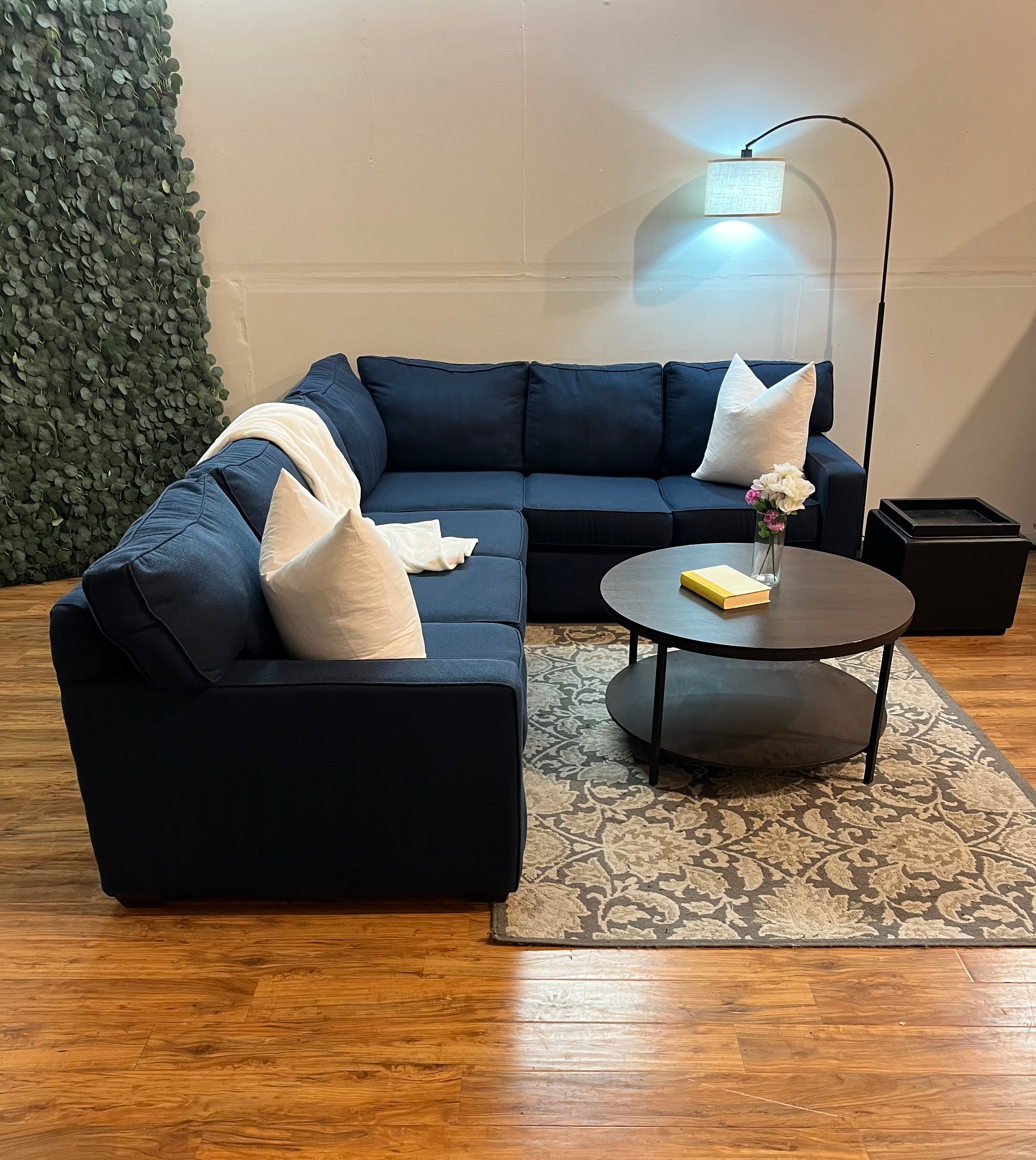 Jordan’s Furniture Corner Sectional in Navy Blue