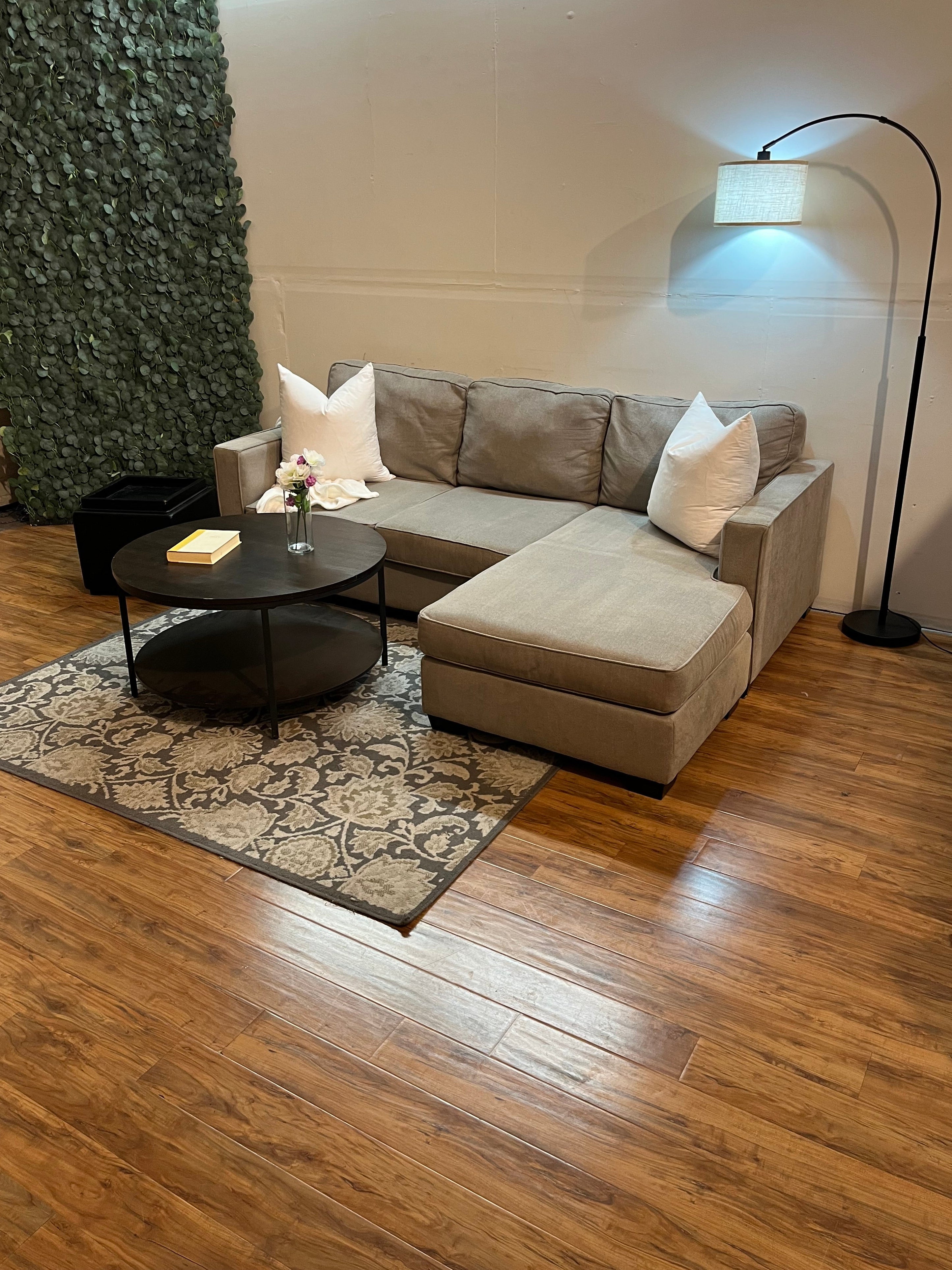 Jordan’s Furniture Sectional with Reversible Chaise in Steel Gray