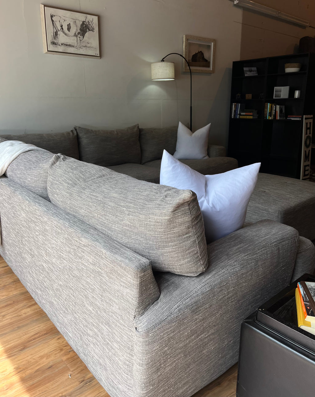 Cardi’s Furniture Sectional and Ottoman in Stone Gray