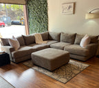 Cardi’s Furniture Sectional and Ottoman in Stone Gray