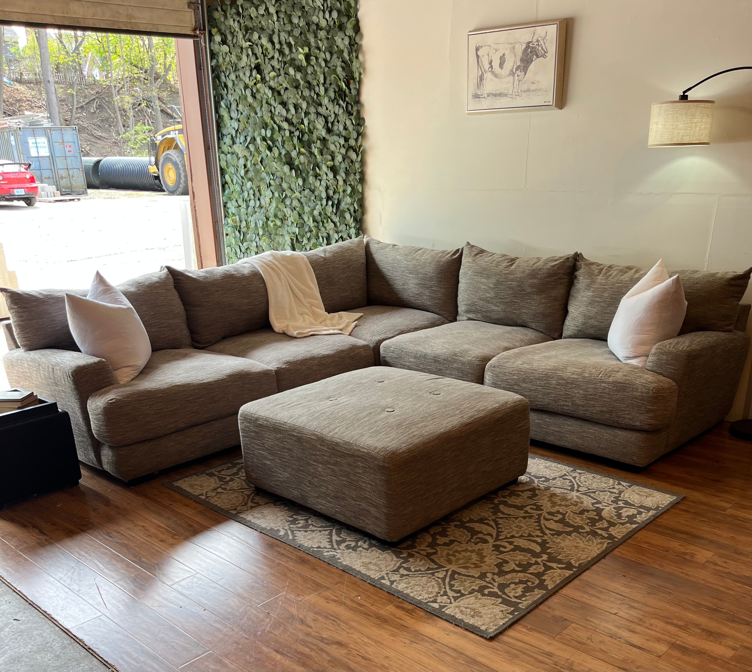 Cardi’s Furniture Sectional and Ottoman in Stone Gray