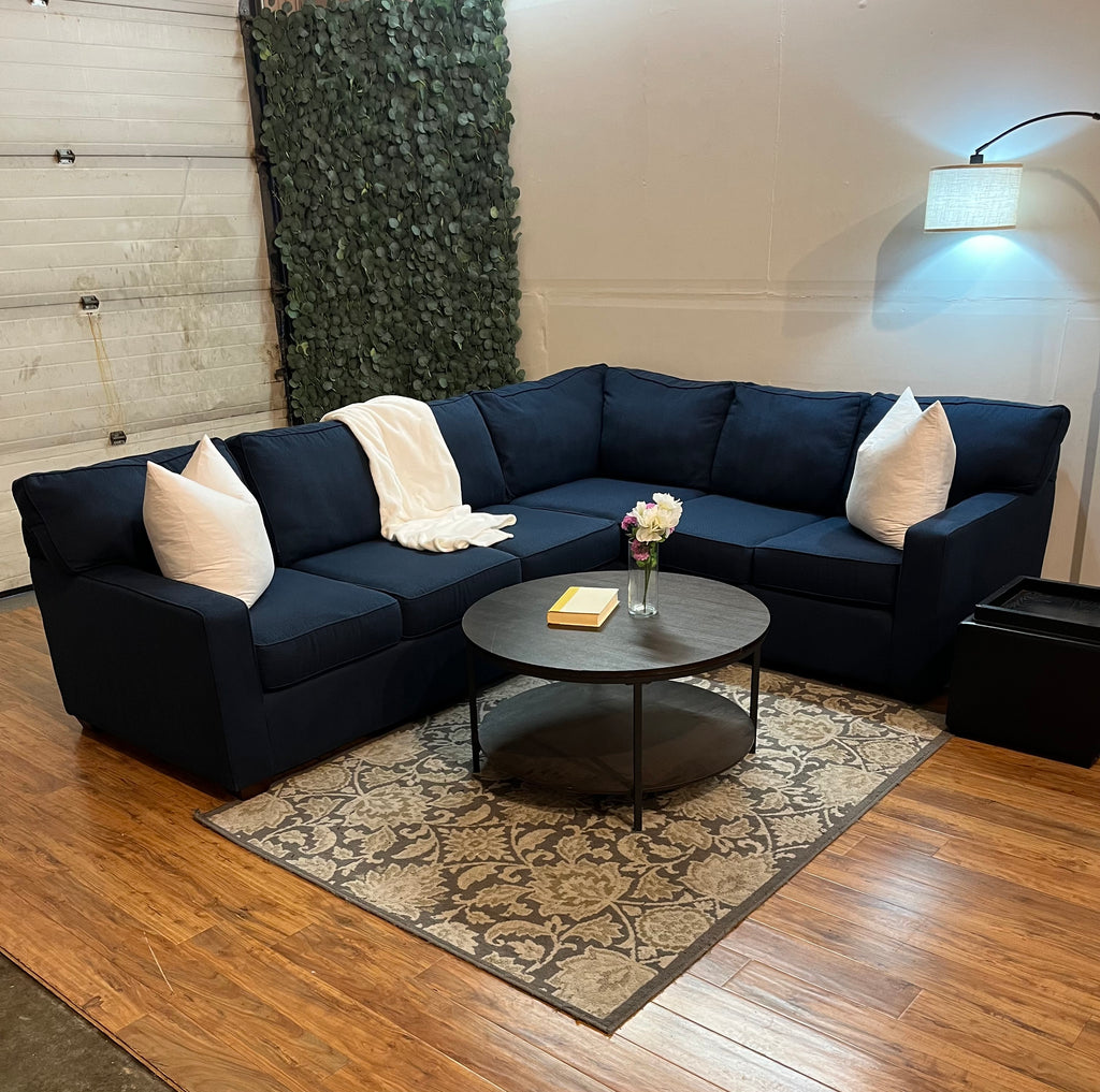 Jordan’s Furniture Corner Sectional in Navy Blue